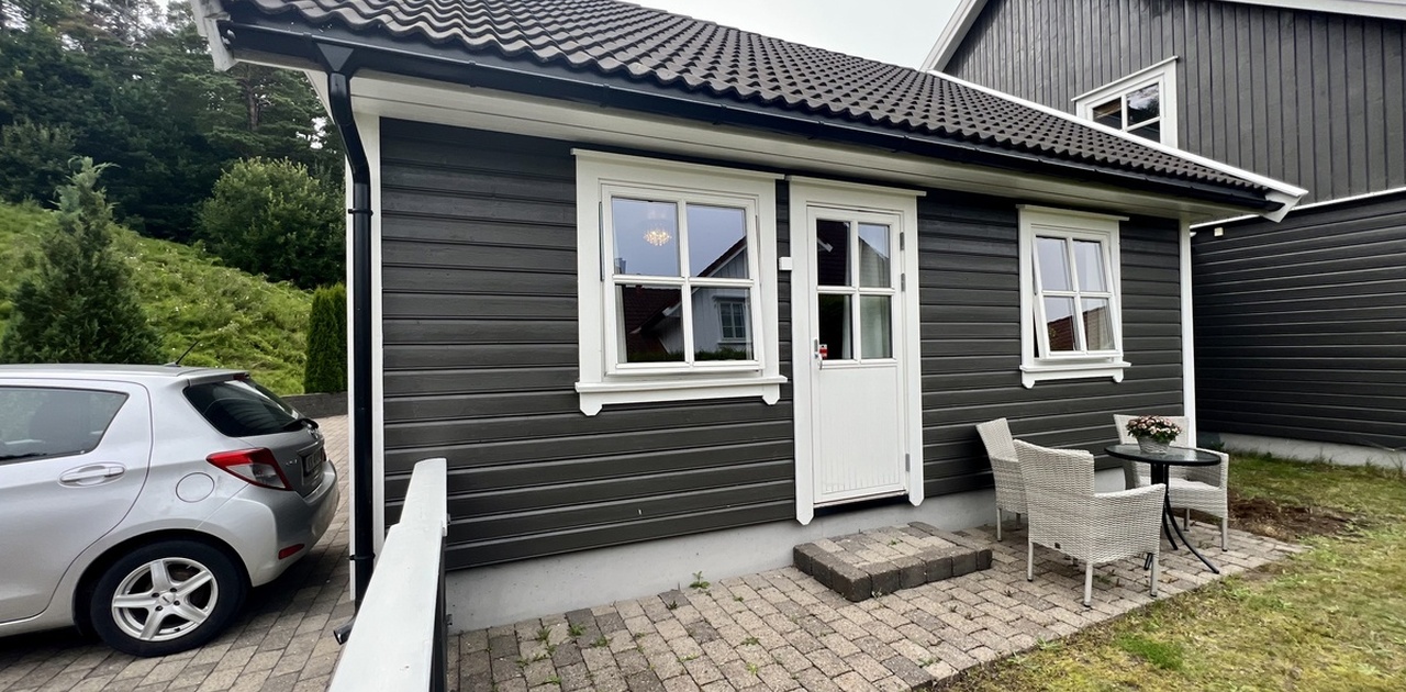 Leilighet med biloppstilling