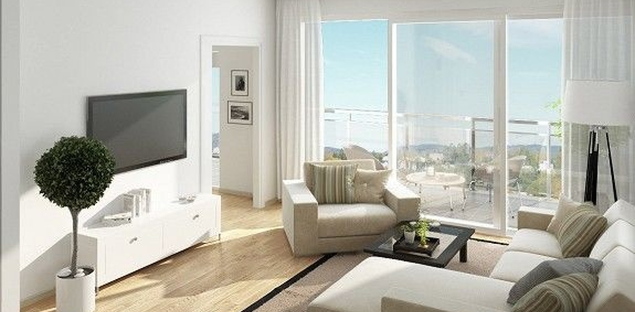 Stue med utsyn til terrasse