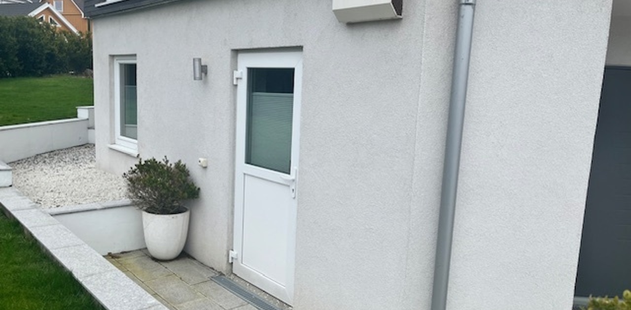 Entrance is via the garden