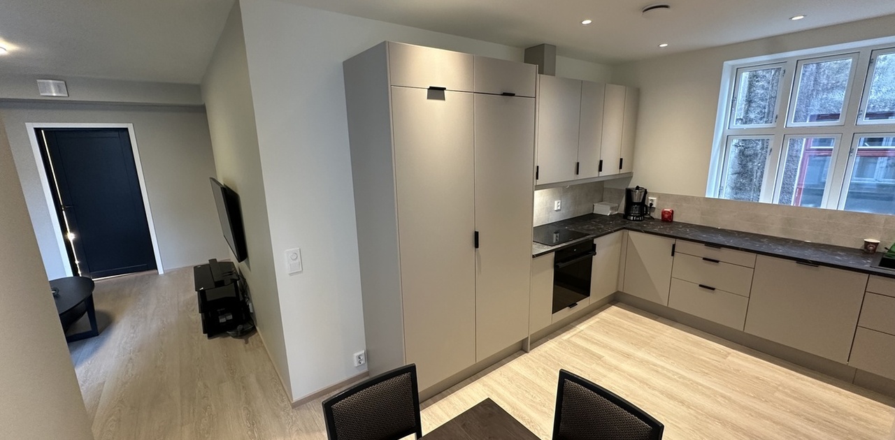 Kjøkken - Åpen stue kjøkkenløsning