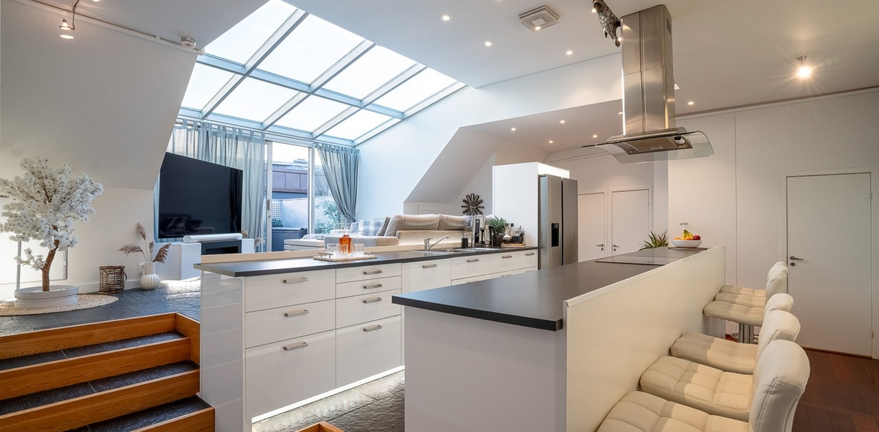 Fellesarealet er hjertet i leiligheten og er på hele 60 m2.
