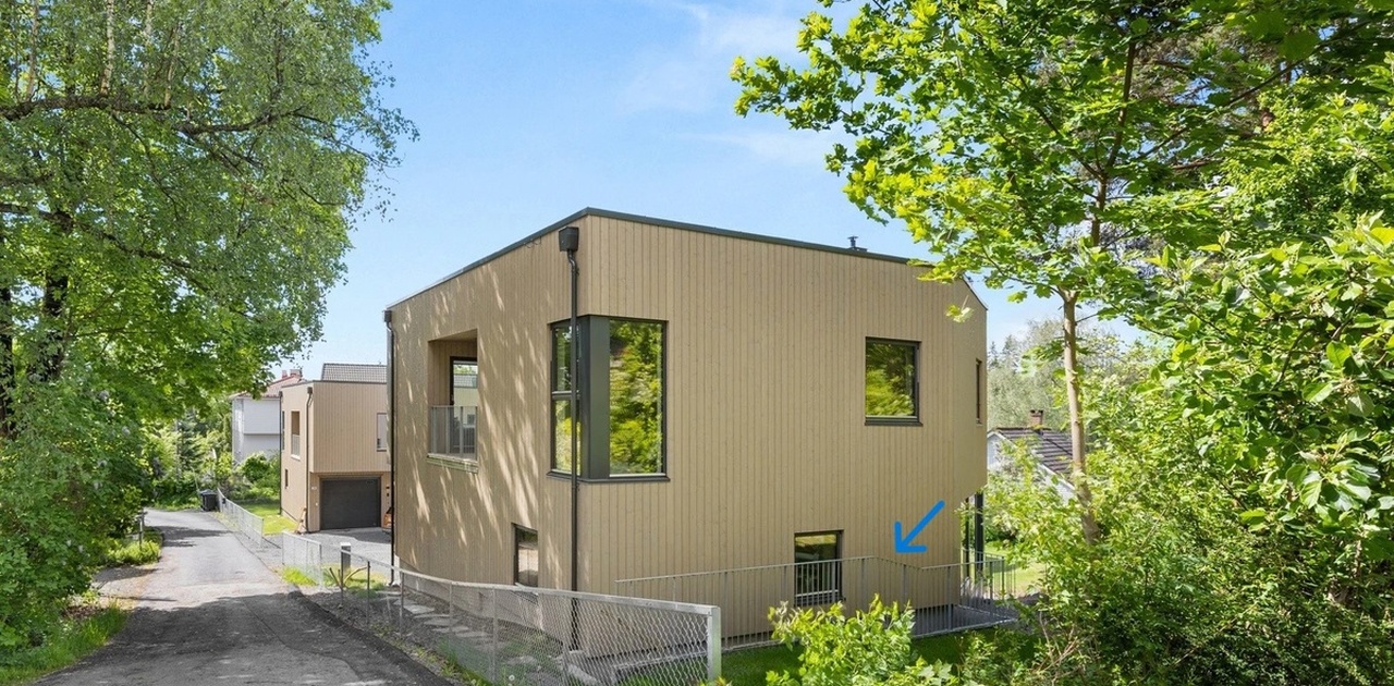 Inngang på bakside av huset er markert