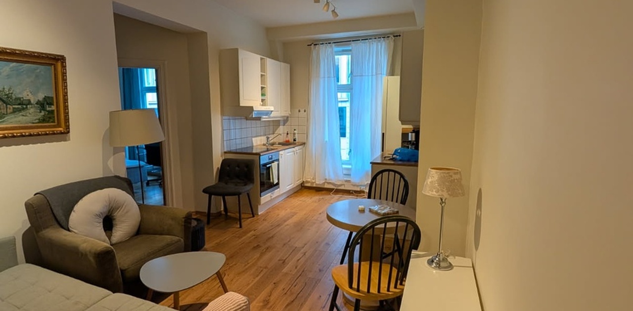 Stue med åpen kjøkkenløsning