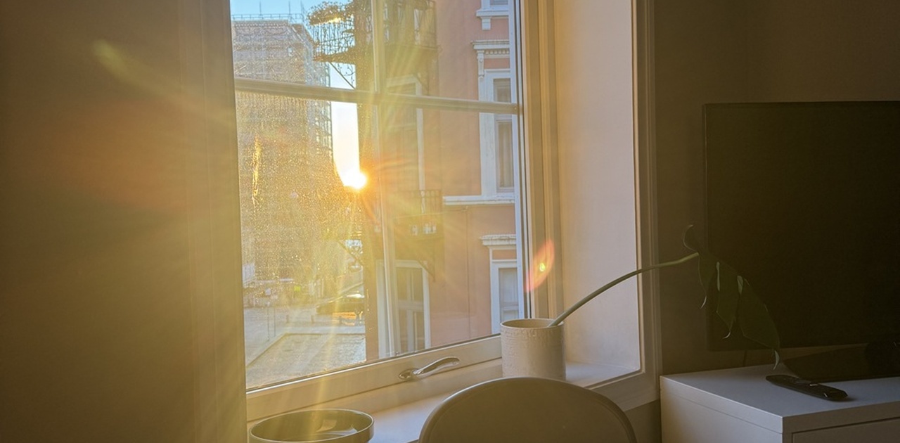 Solnedgang fra stuen/kjøkken