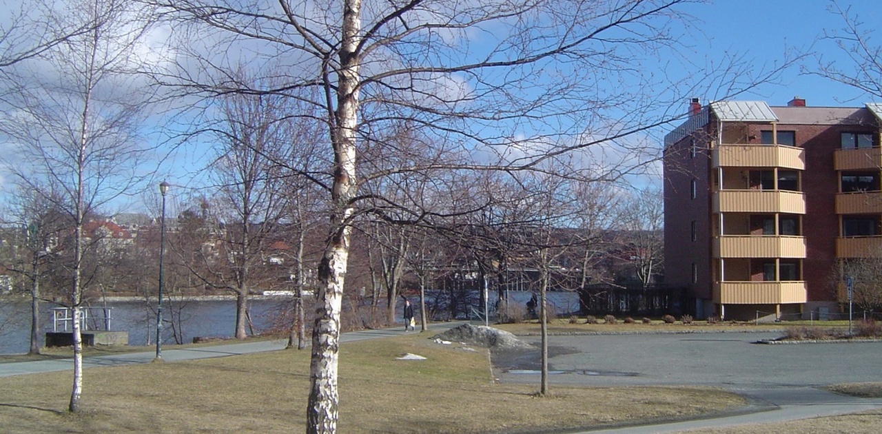 Building by river promenade