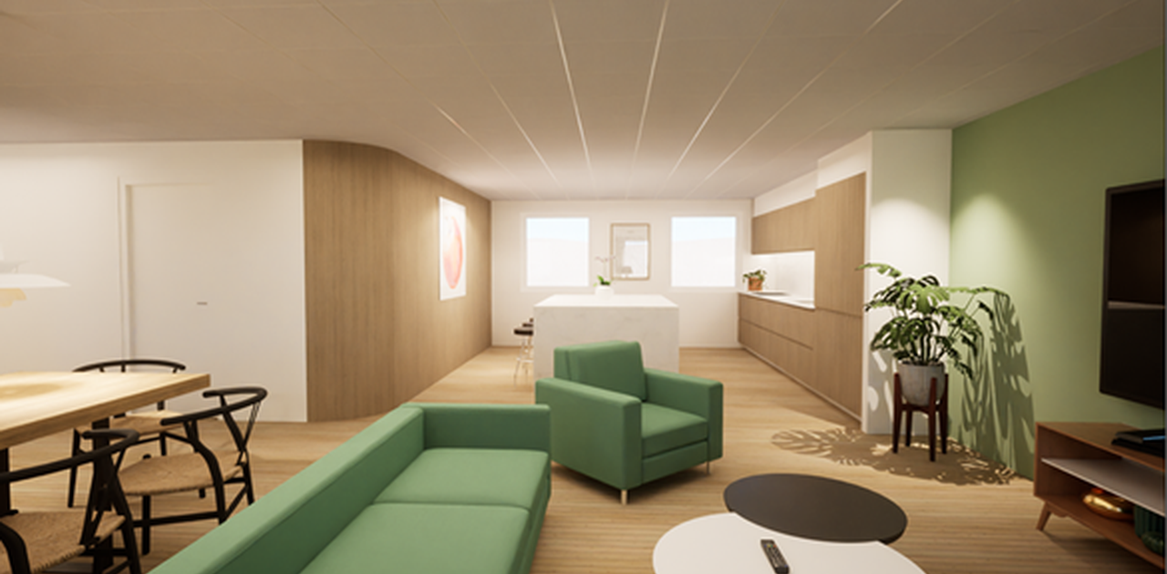 Stort oppholdsrom med stue og åpen kjøkkenløsning