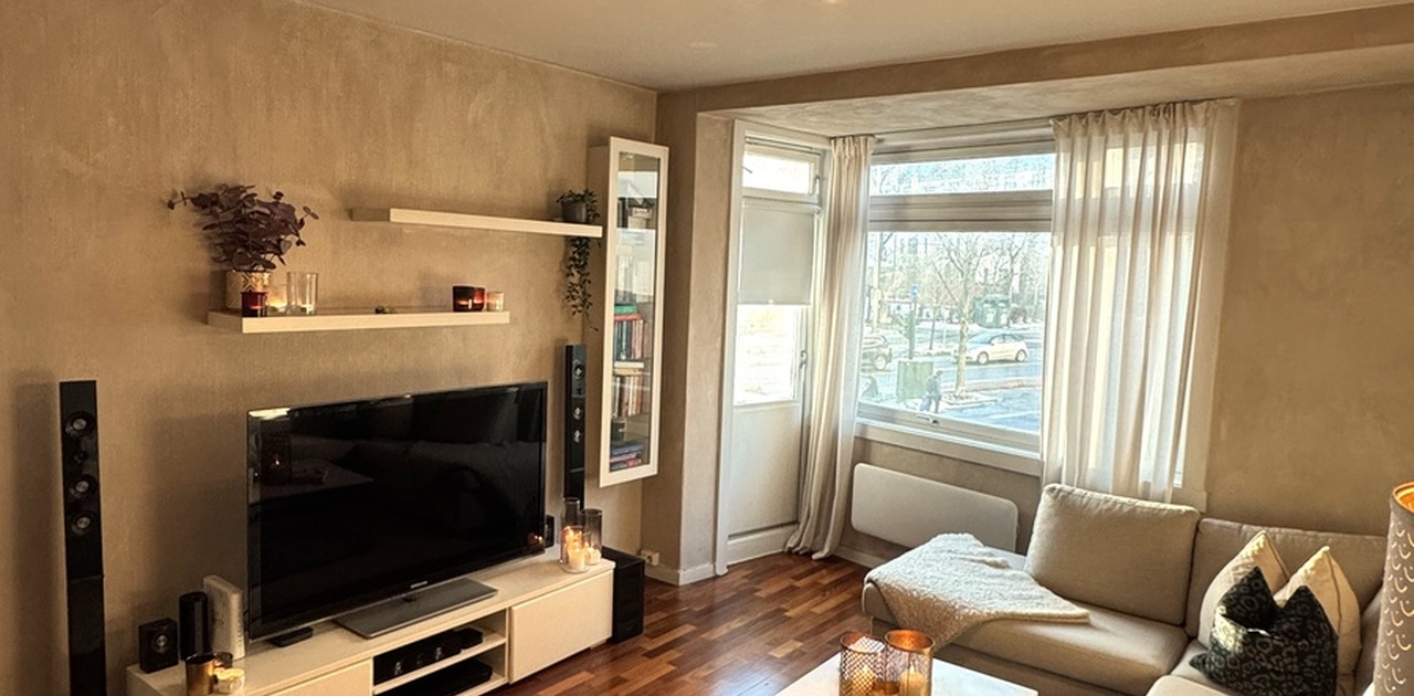 Living room with easy access to the balcony!