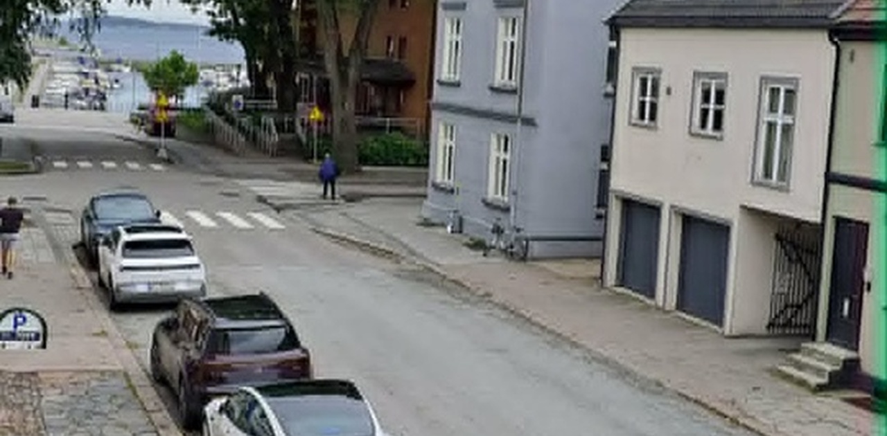 Ut av vinduet venstre mot stranden