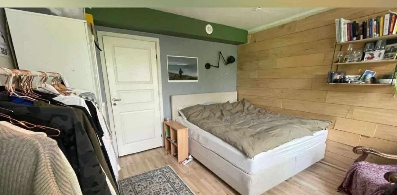 the room with wood on one wall